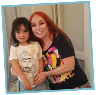 Joy Musiker Cohen with her granddaughterpassing along Beatle love to another - photo 2