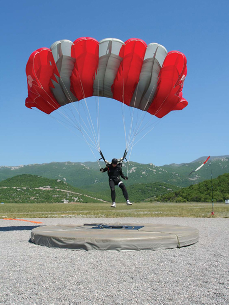 In competition skydivers earn points for landing on the target Skysurfing - photo 15