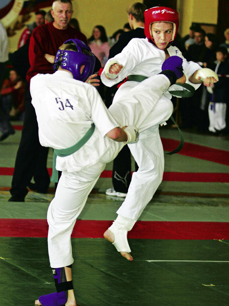 DEFENDING YOURSELF Kickboxing is not just kicking and hitting A kickboxer must - photo 9