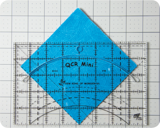 2Align the adjoining sides along the dashed V lines on the QCRM ruler - photo 24