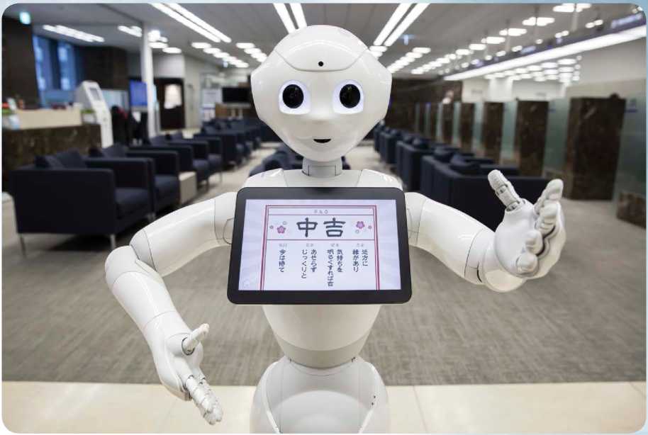 A Pepper humanoid robot designed by SoftBank Group as a companion robot to - photo 5