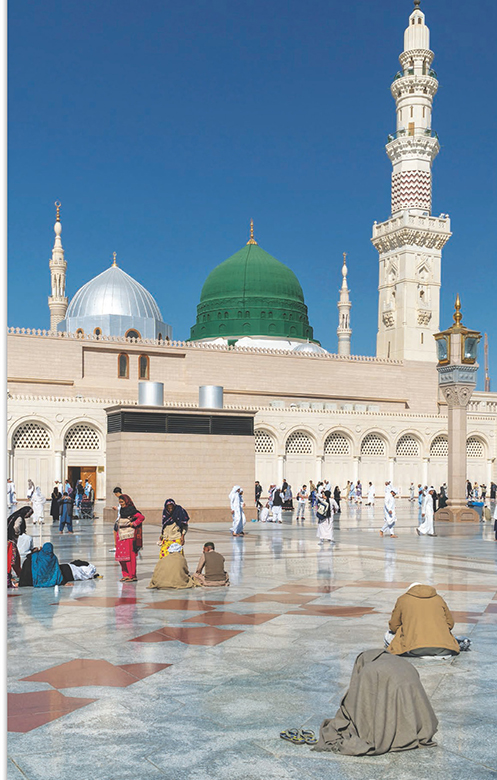 Pilgrims visit the Prophets Mosque in the holy city of Medina Saudi Arabia - photo 6