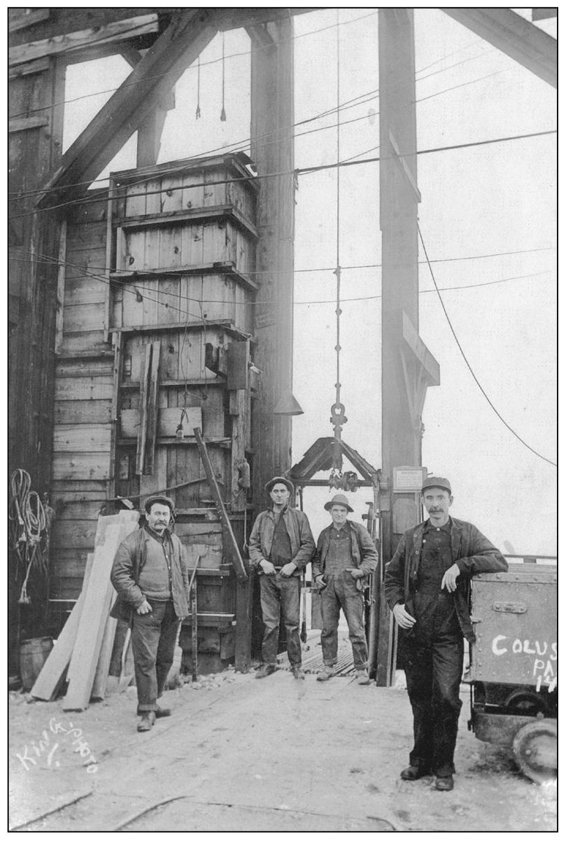 John Shea right and unidentified fellow workers stop to pose for a picture - photo 6