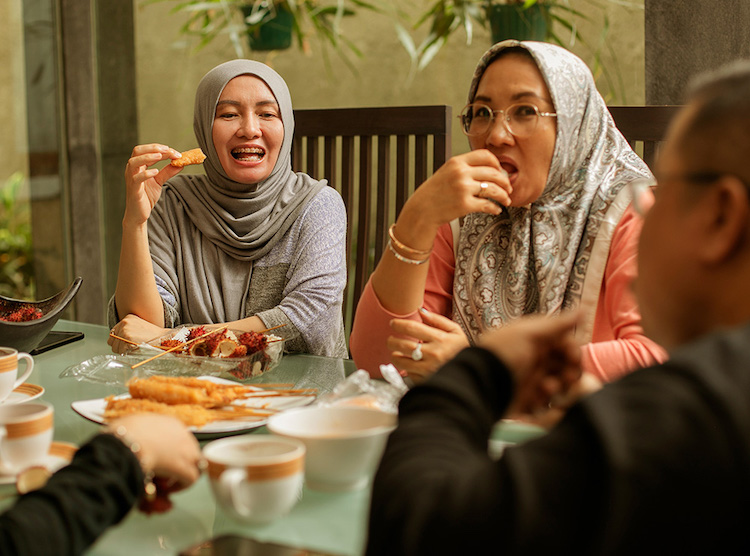 A night-time meal at Ramadan At the end of Ramadan people celebrate with a big - photo 9