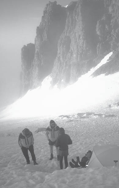 Rangers at Camp Schurman discussing route conditions with climbers - photo 6