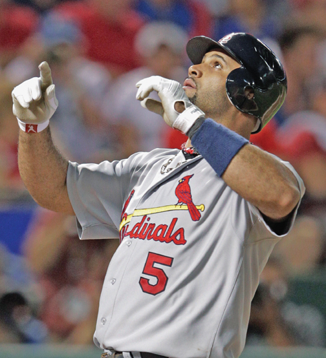 Image Credit AP ImagesCharlie Riedel Albert Pujols celebrates at home plate - photo 3