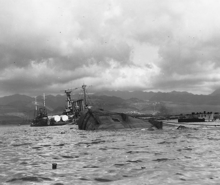 The capsized USS Utah and the USS Raleigh in the background after the - photo 2