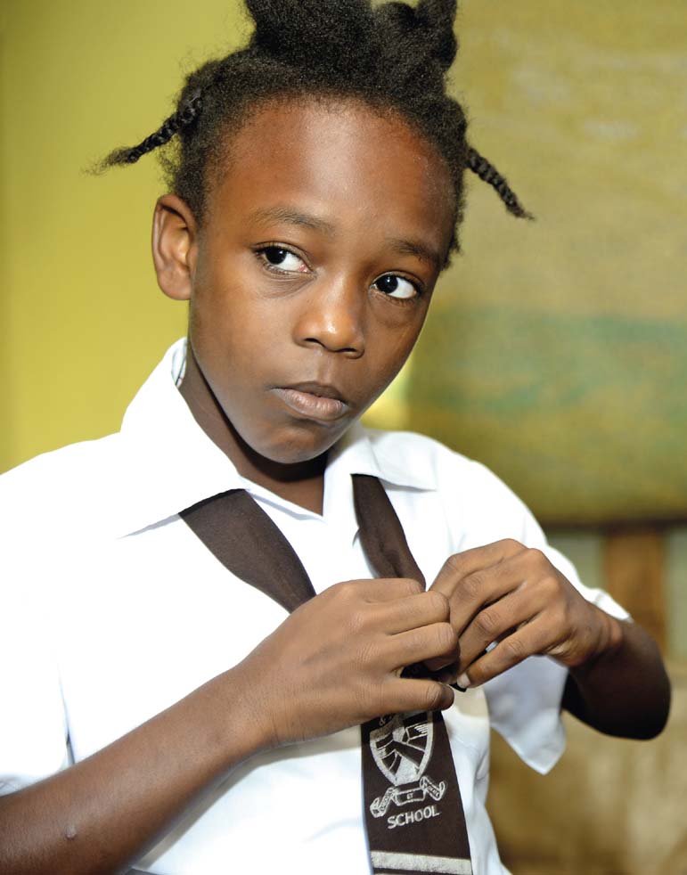 My uniform is a brown skirt and tie with the school emblem and a white - photo 4