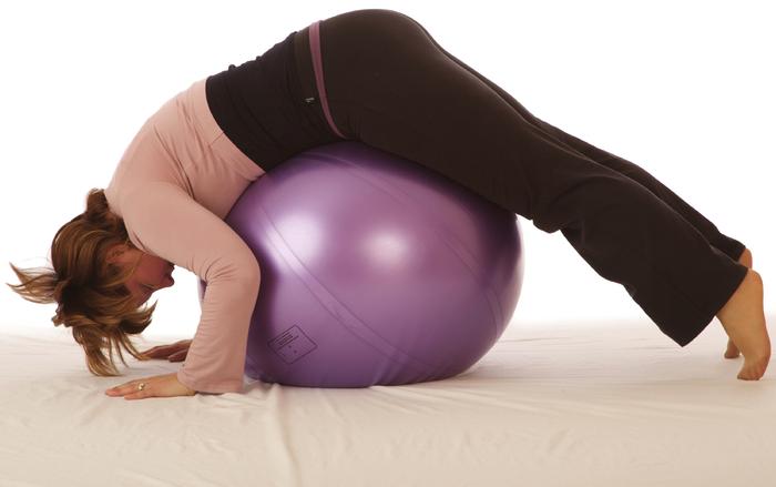 Liza demonstrating a lumbar stretch two months after a caesarean F rom - photo 2