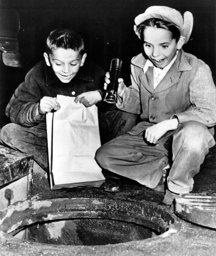 Two young boys in Cleveland are delighted to find several coins after chasing a - photo 3