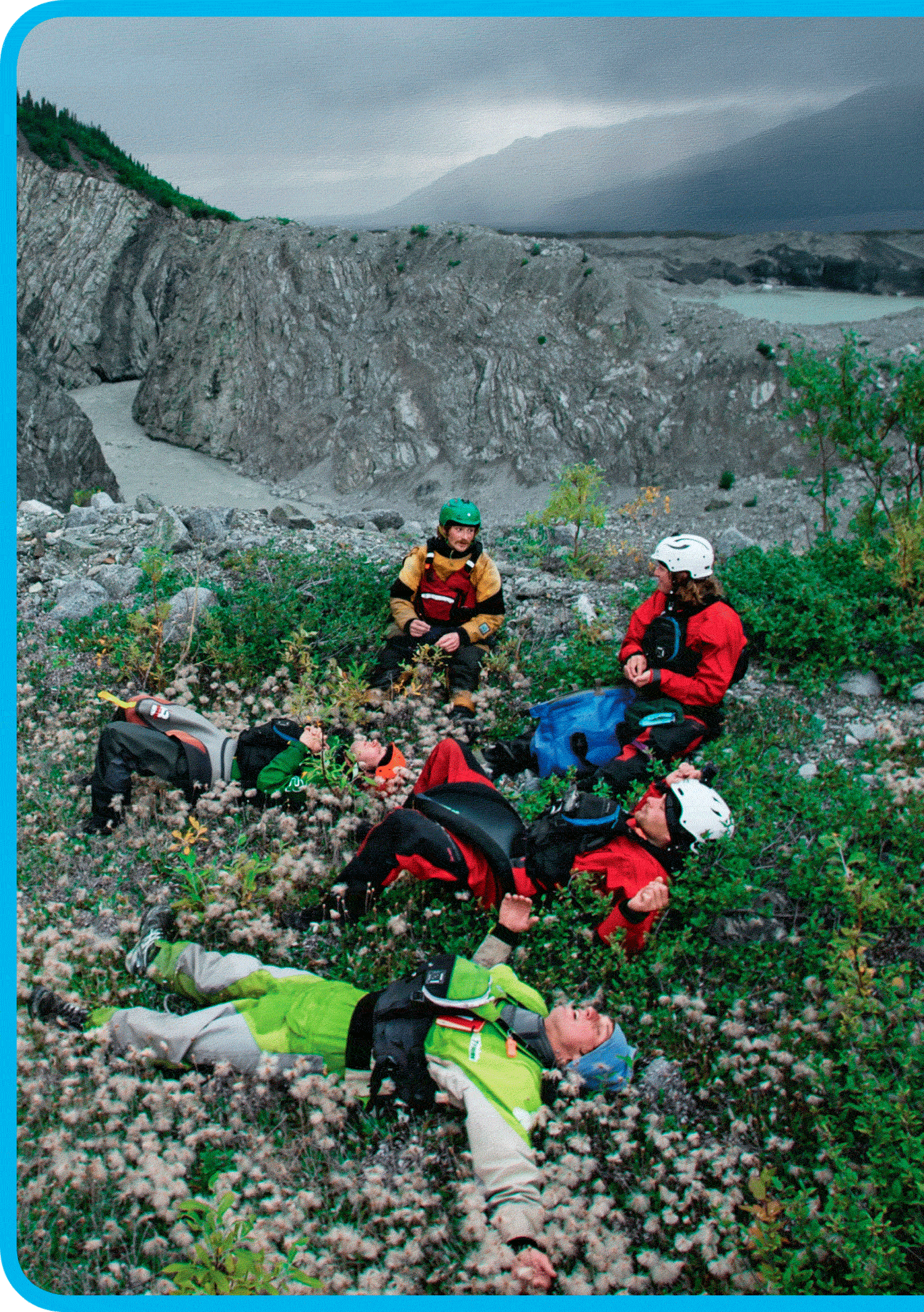 The team rests in a patch of cottongrass after scouting the first portion of - photo 8