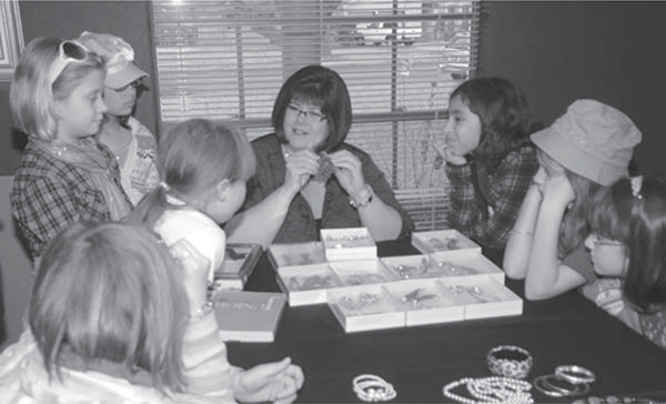 Pamela Y Wiggins shares a lesson on costume jewelry history with a Central - photo 2