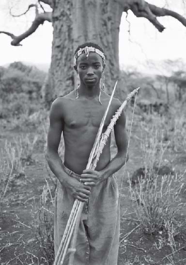 A young Hadzabe tribesman one of my ancient relatives in the Great Rift - photo 5