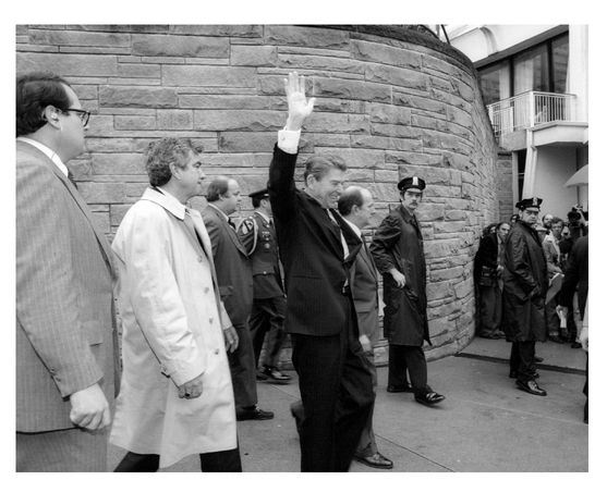 Top Reagan leaving the Washington Hilton Hotel seconds before an assassination - photo 3