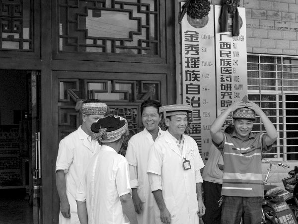 Figure 1 Staff at a Yao nationality hospital prepare to pose for a group - photo 3