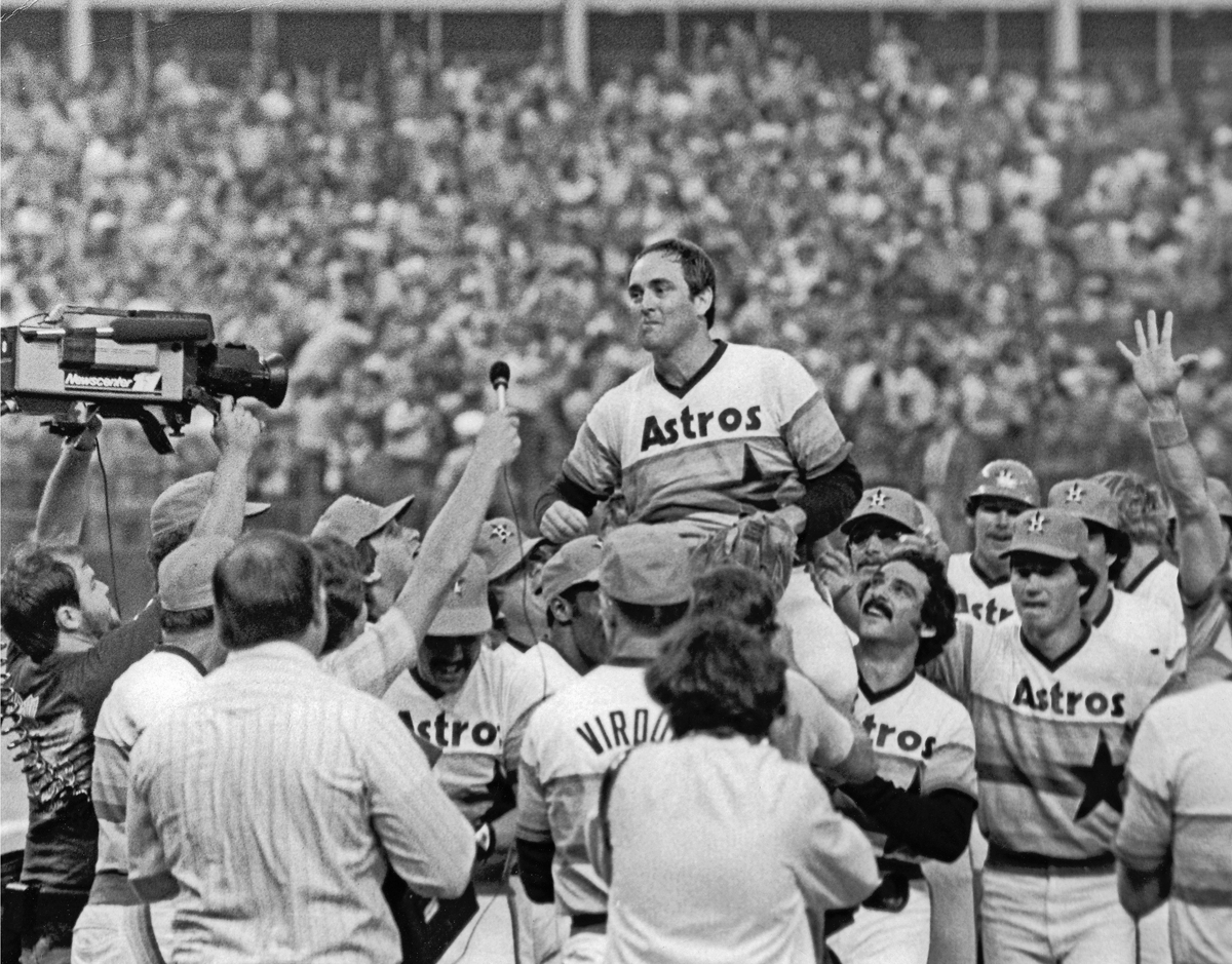 The Houston Astros carry Nolan Ryan from the field following Ryans fifth career - photo 3