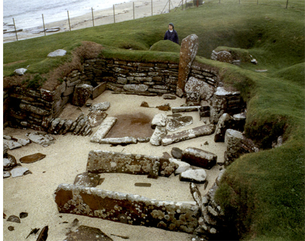 A wide embankment surrounding Skara Brae provides views into the ancient - photo 6