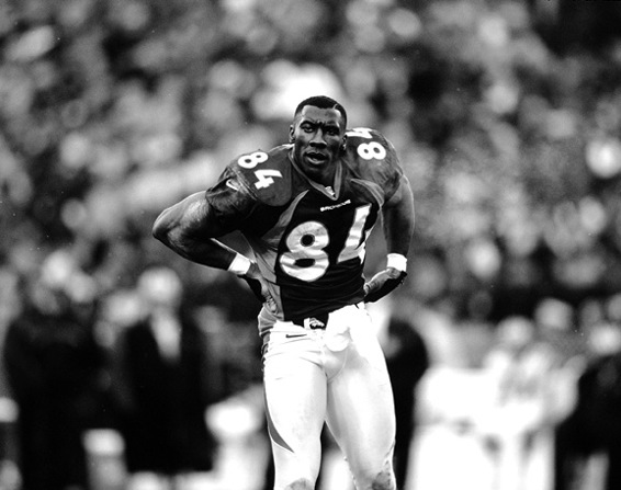 Hall of Fame tight end Shannon Sharpe sizes up the competition during a 1997 - photo 1