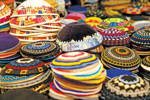 colorful kippot for sale Israel and the West Bank are lands of religious - photo 7