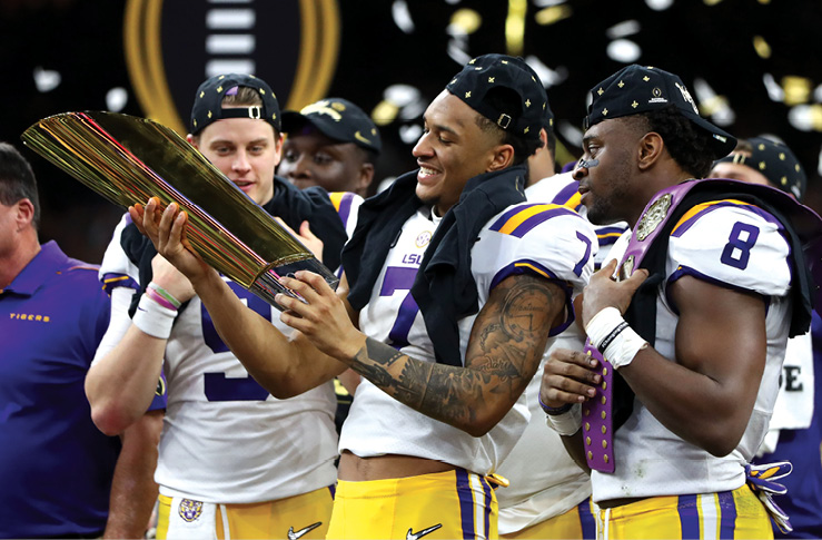 Safety Grant Delpit admires the national championship trophy after LSU defeated - photo 3