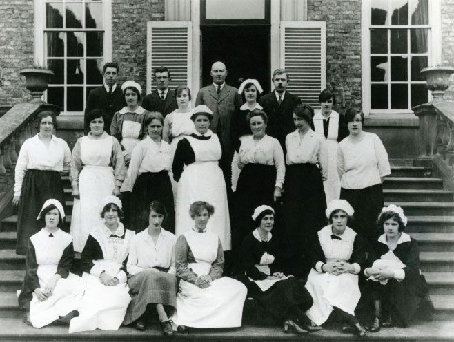 A group portrait of staff on the garden steps at Erddig in the early twentieth - photo 4