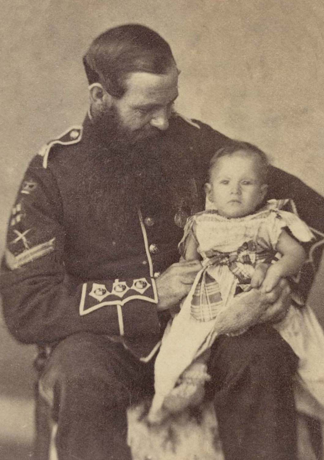 This nineteenth-century army child was clearly doted upon by his or her father - photo 4