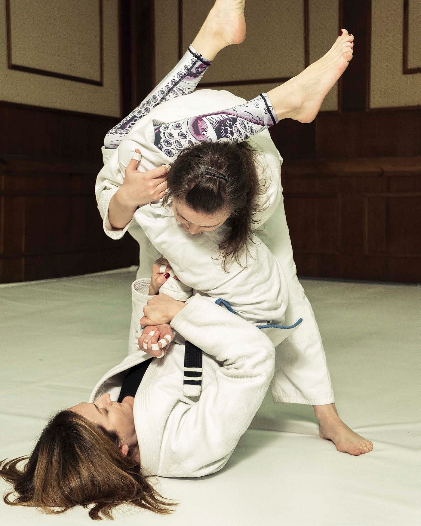 Jujitsu matches start with opponents standing up but often they end up on the - photo 2