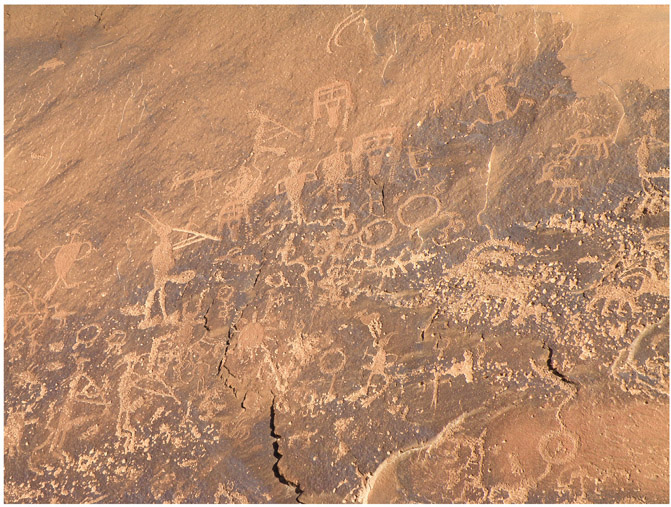 Ancient petroglyphs at Sand Island The entire panel exhibits a mix of - photo 4