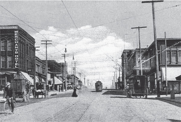 Top Street lights and automobiles adorn Hewitt and Rucker Avenues Bottom - photo 5