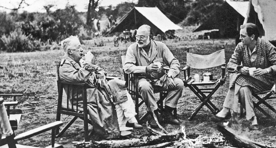 On safari with white hunters Philip Perceval at left and his son Richard - photo 5