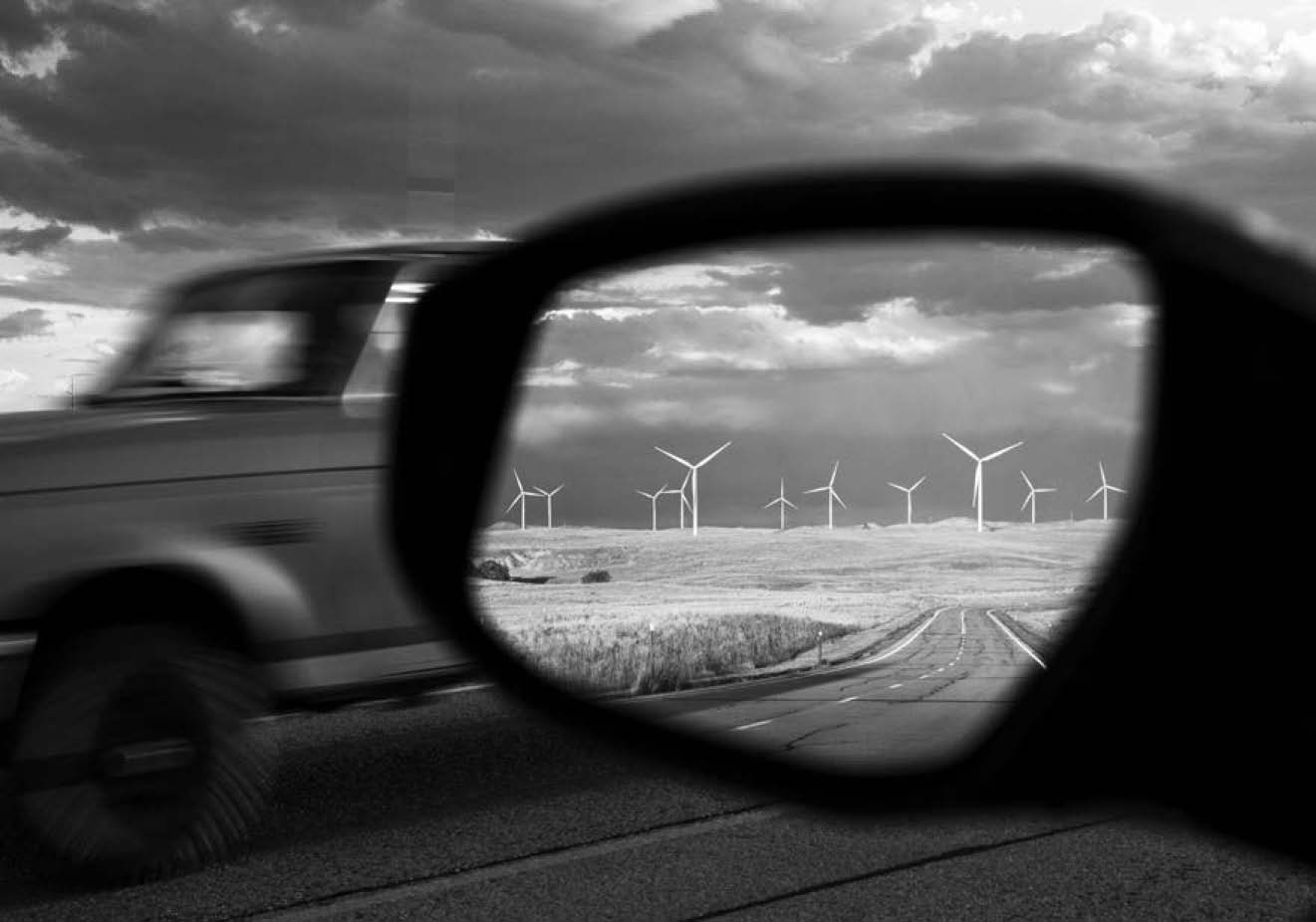 Seen in reflection Duke Energys Top of the World wind farm near Glenrock - photo 3