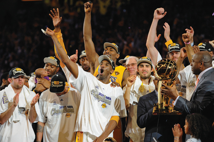 Image Credit AP Images Mark J Terrill Kobe Bryant center celebrates with - photo 6