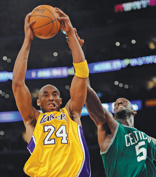 Image Credit AP Images Mark J Terrill Kobe Bryant grabs a rebound in front - photo 5