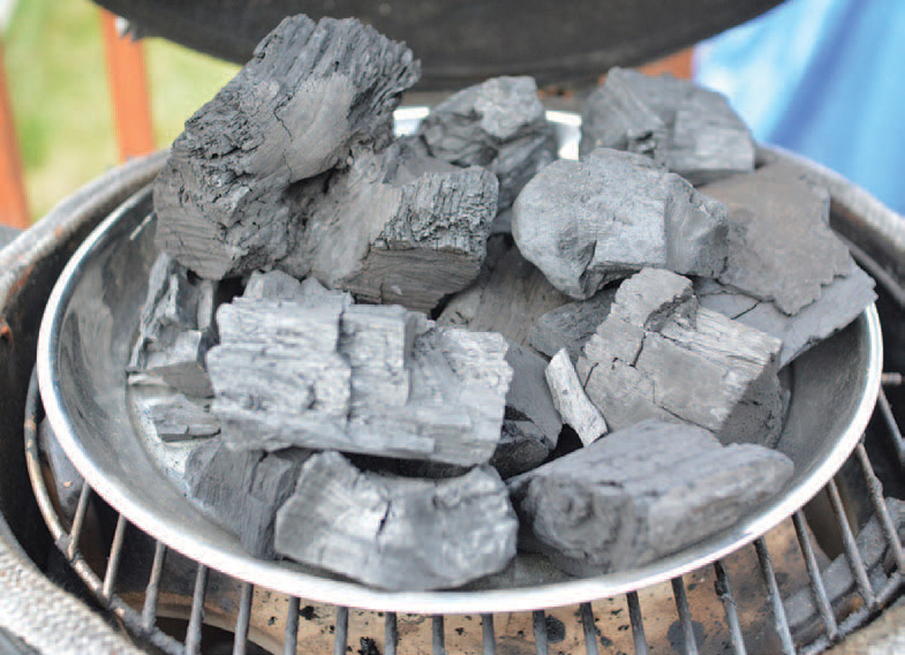 There are various methods of lighting the hardwood lump charcoal that range - photo 3