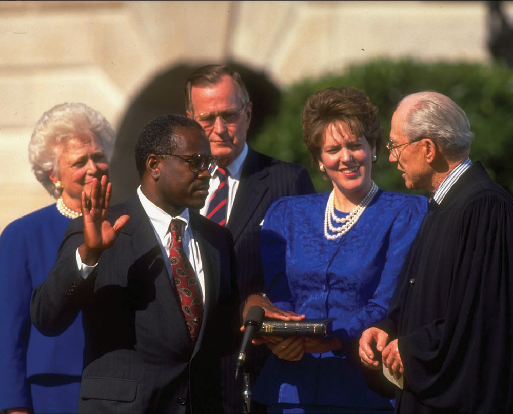 Associate Justice Byron White far right gives the constitutional oath to - photo 3