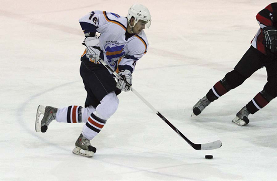 When a hockey player increases their velocity as they move across the ice - photo 5