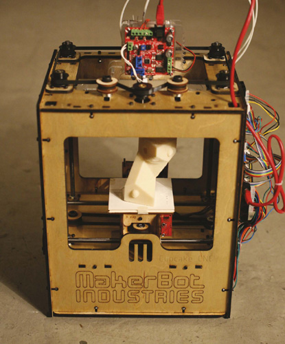 Plans for this MakerBot 3-D printer can be downloaded allowing the user to - photo 3