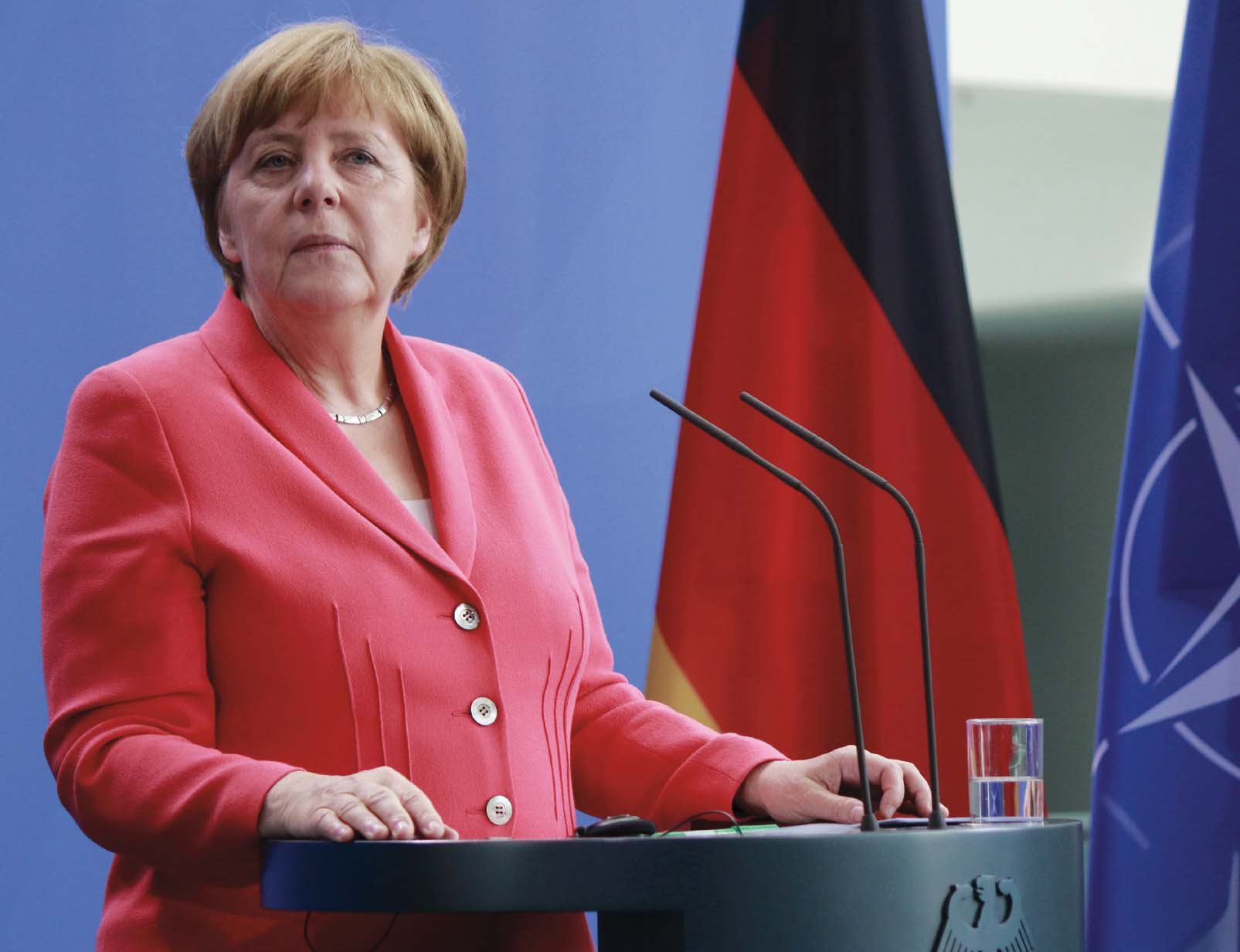 Angela Merkel at a press conference after a meeting with the NATO Secretary - photo 4