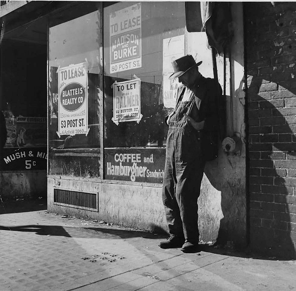 An unemployed man stands in front of a vacant store in 1935 The Great - photo 3