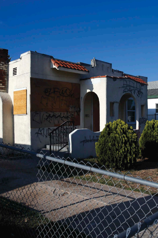 Opposite This abandoned and graffiti-covered house is one of many such houses - photo 6