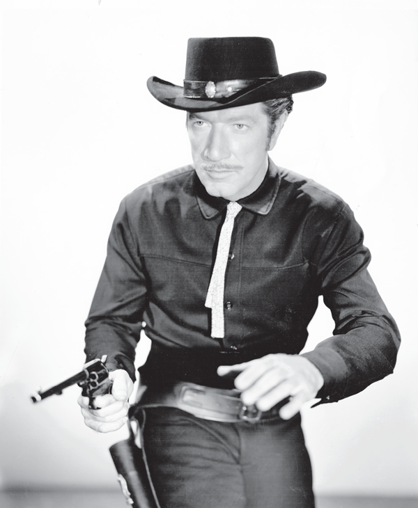 Drawing his gun Paladin Richard Boone the hero of a different kind of - photo 3