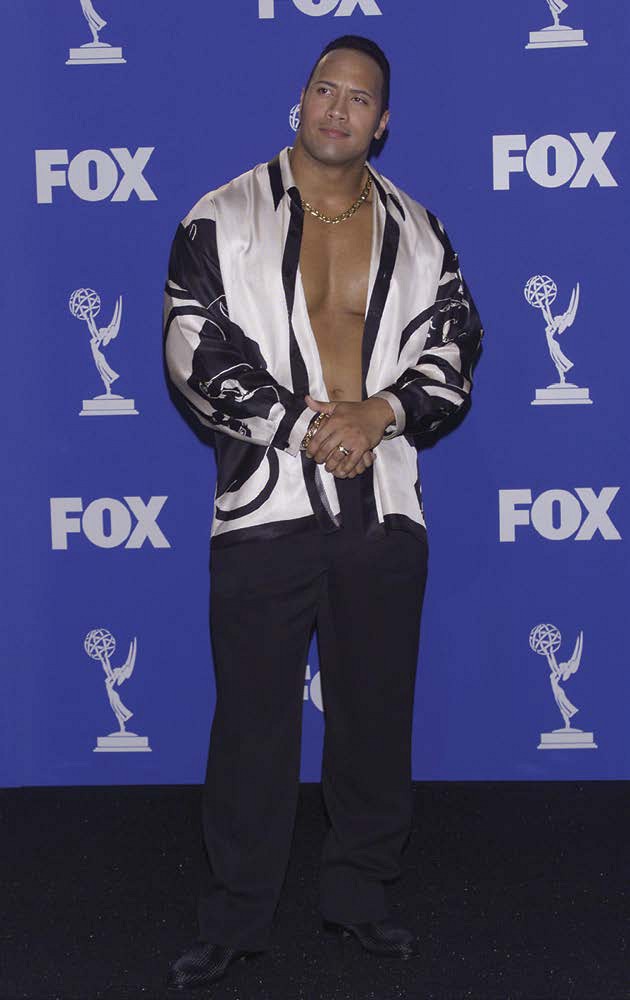 Dwayne attends the 1999 Emmys In his early years as a wrestler he struggled - photo 8