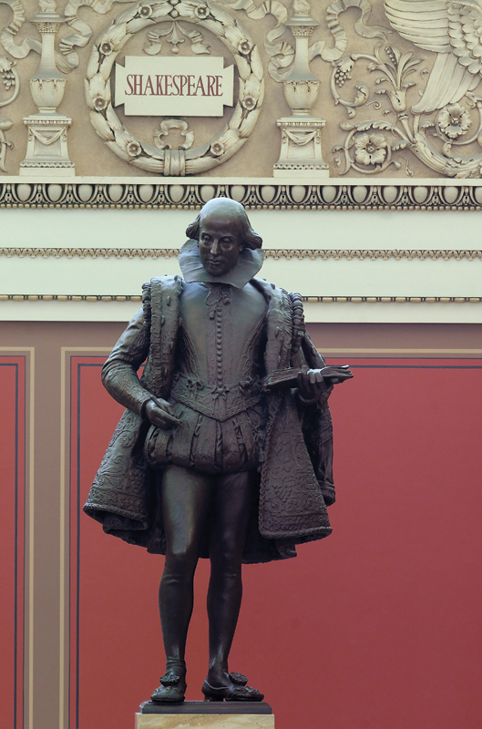 Statue of William Shakespeare watching over visitors in the main reading room - photo 5