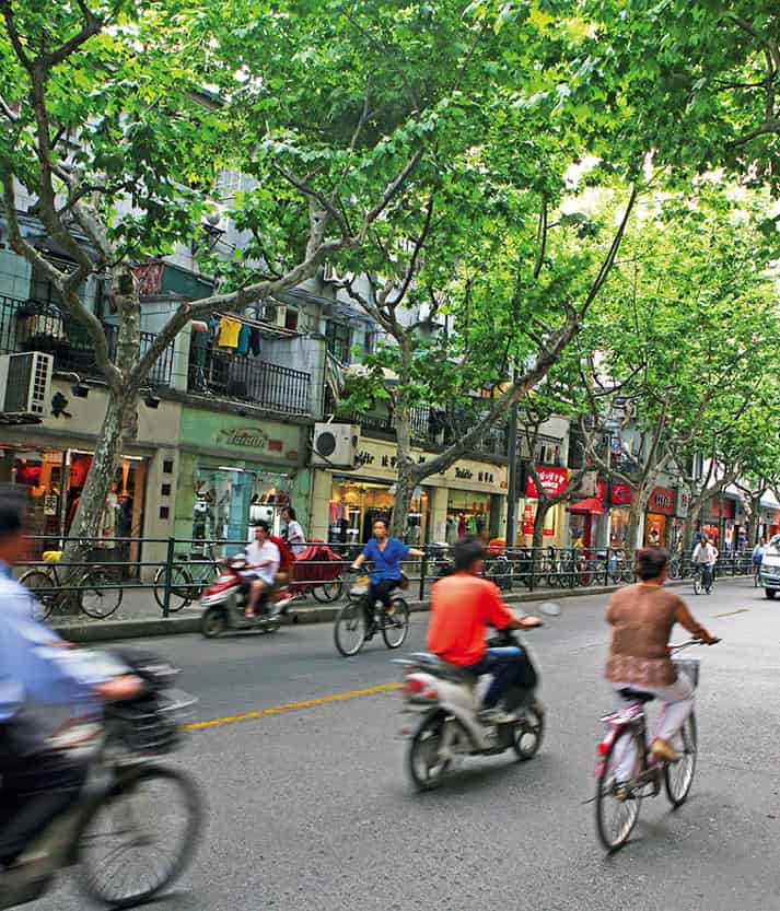 Getty Images Shanghai life is lived on the streets Vibrant French Concession - photo 5