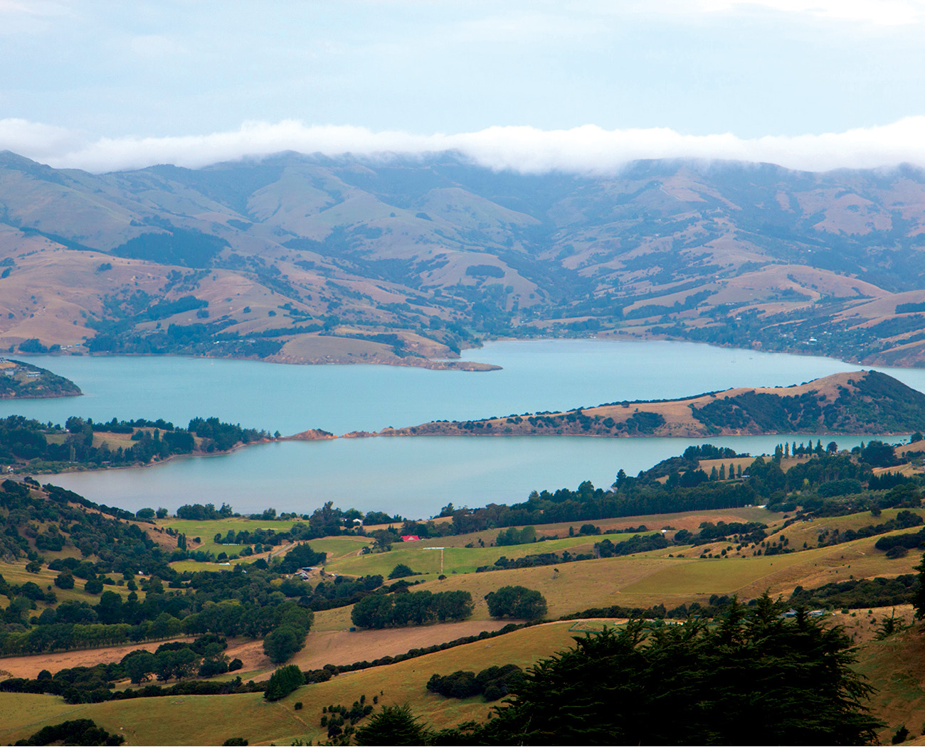 The picturesque settlement of Akaroa is nestled in a volcanic valley - photo 21