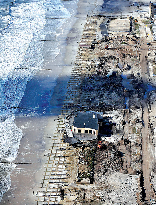 An aerial view captures the devastation along the coast in Rockaway Beach - photo 7