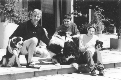 Peter at home with his beloved Border Collie dogs and two of the authors - photo 4