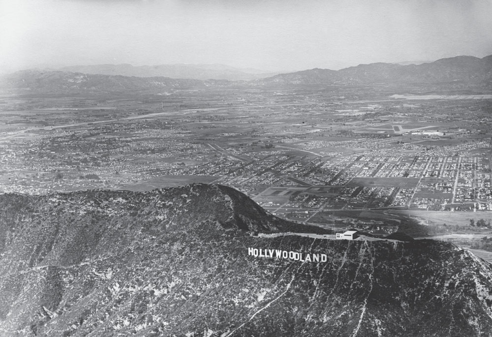 The building pictured here atop the Hollywood sign would make local television - photo 2