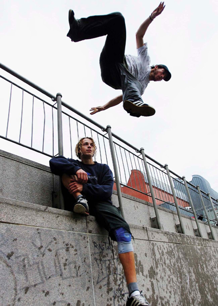 RISK FACTOR A man who practices parkour is called a traceur truh-SUHR A - photo 2