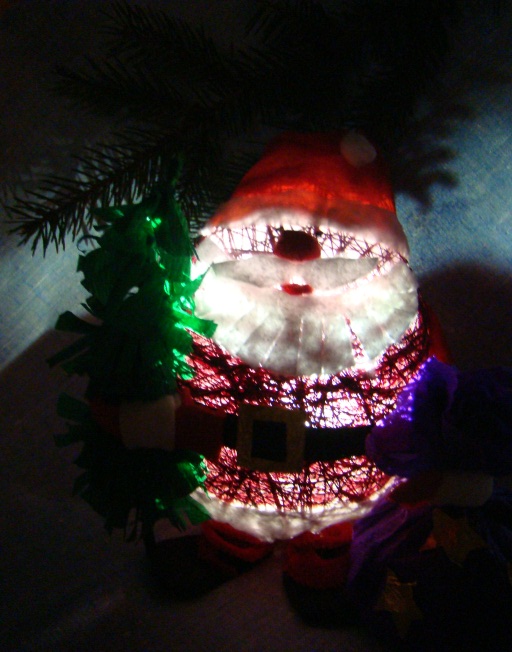 Santa Claus hurries to you Look how he glowsin darkness near the lamp Little - photo 25